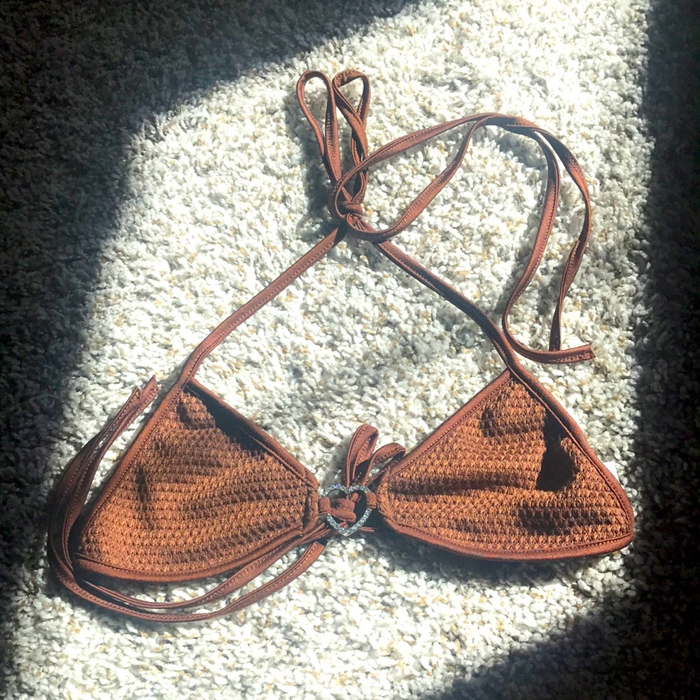A shaped heart rhinestone backless knot halter top